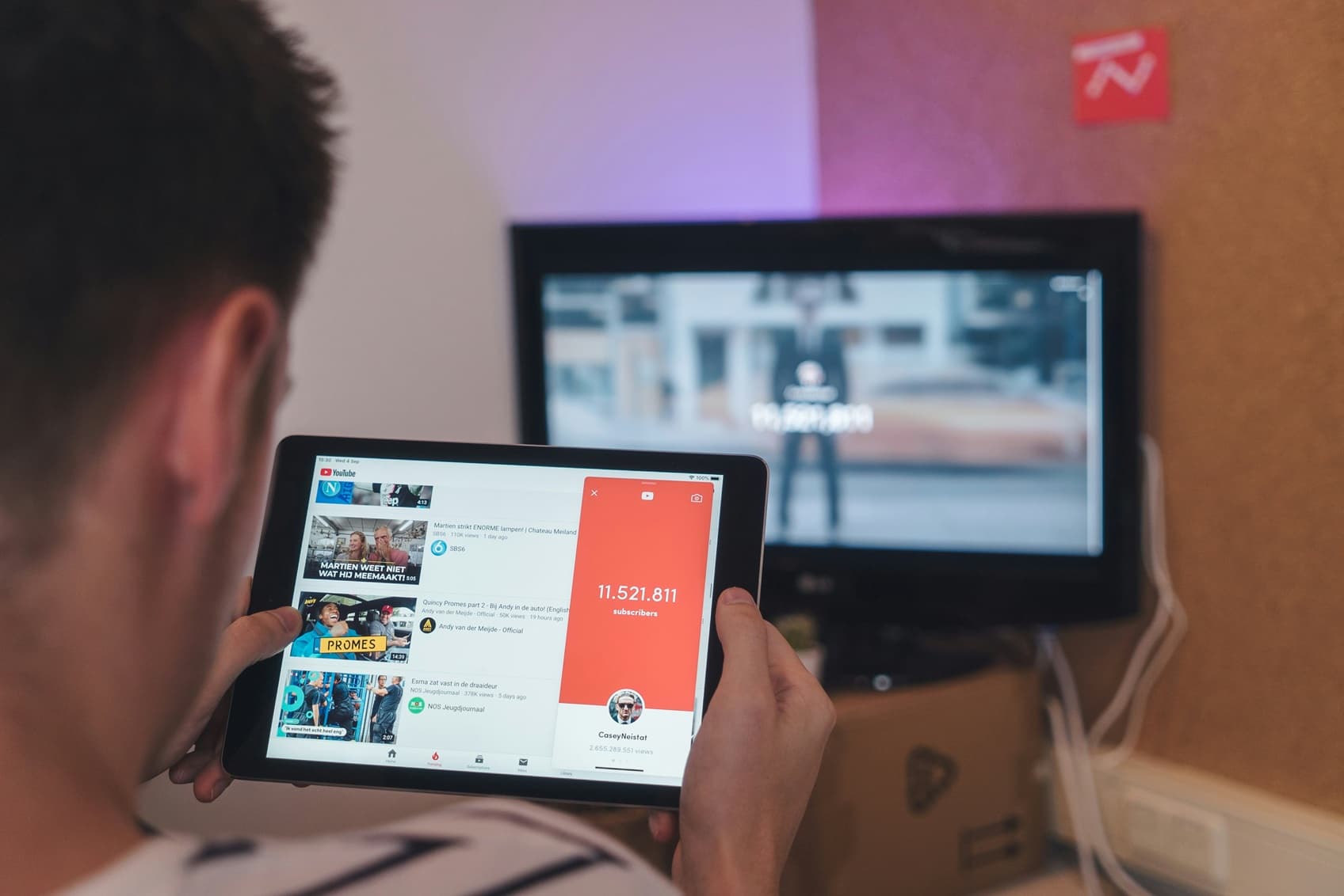 Person watching videos instead of working